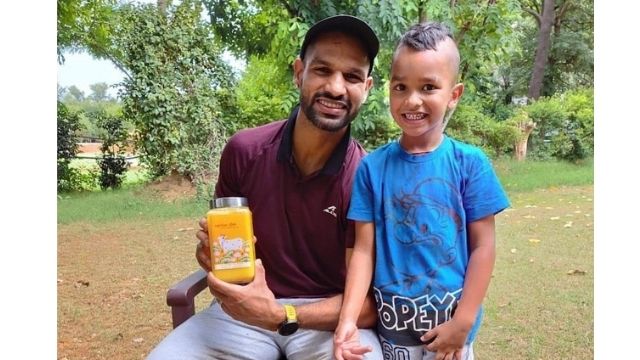 Cricketer Shikhar Dhawan & his son with Amritam Ghee