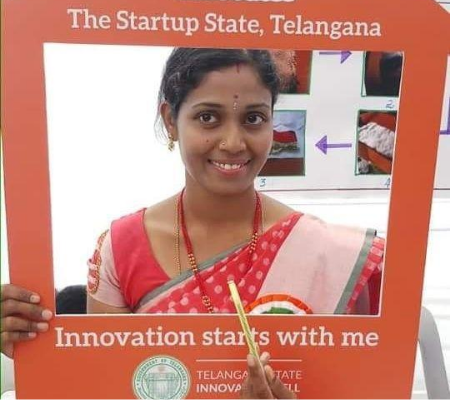 Haritha with her pencil with seed prototype